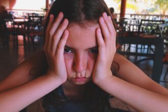 Child experiencing anxiety during a social event.jpg