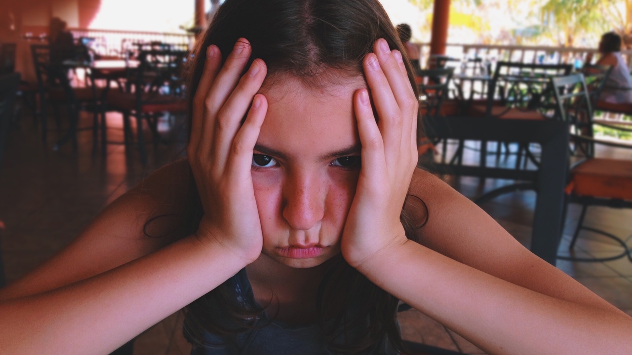 Child experiencing anxiety during a social event.jpg