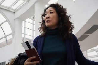 Eve sandra oh holding a passport and looking nervous in killing eve season 1 finale god i m tired.jp .jpeg