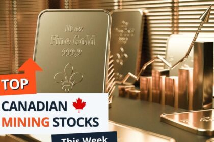 Standing gold bar in front of stacks of gold bars words read 5 top canadian mining stocks this week.jpeg