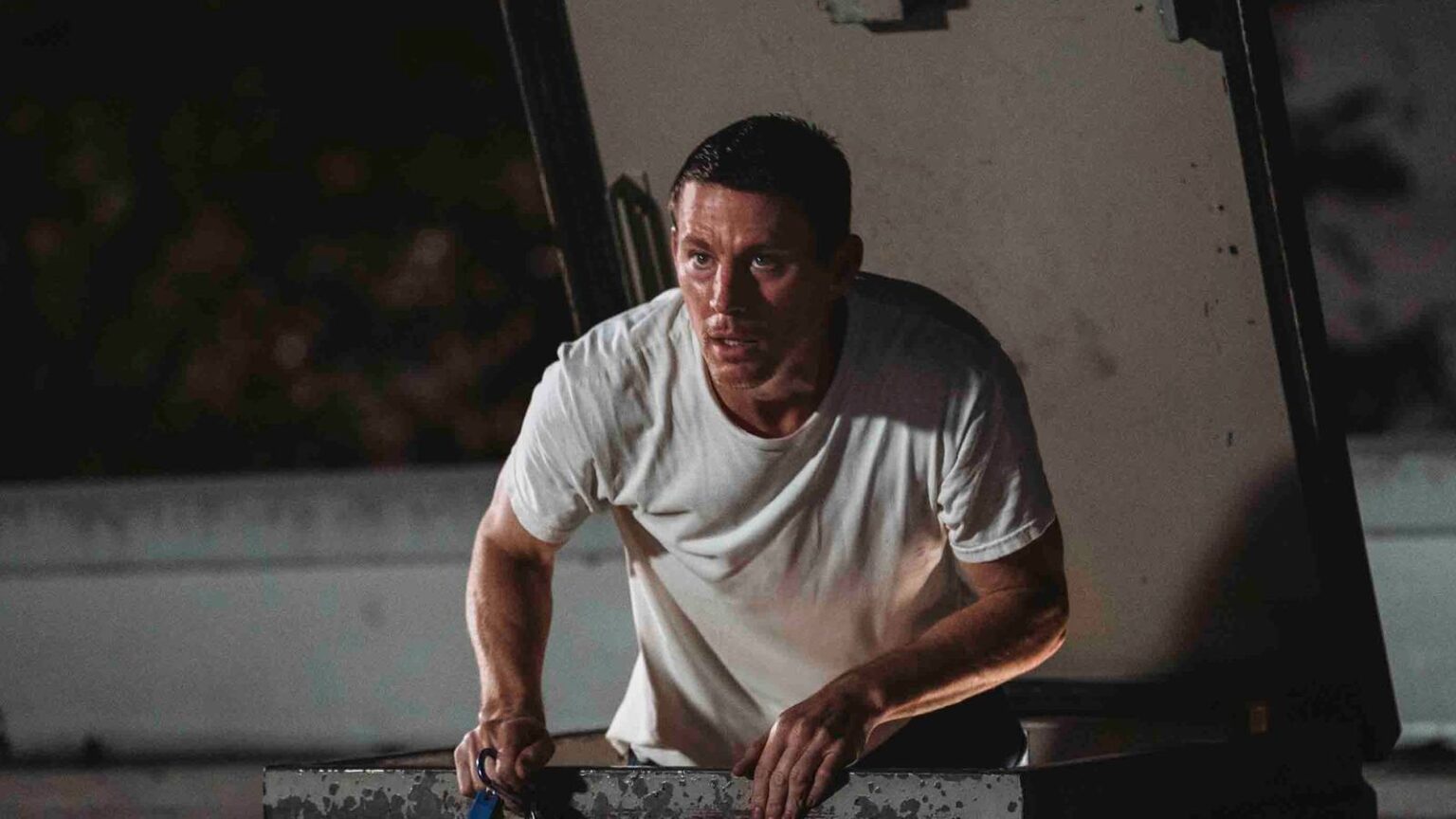 Channing tatum emerging from a roof hatch in roofman.jpg