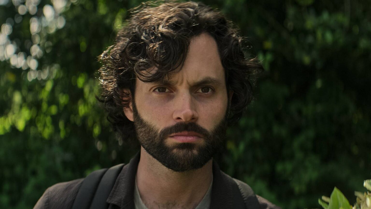 Joe with a beard and looking serious in you.jpg