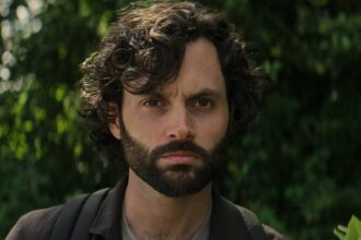 Joe with a beard and looking serious in you.jpg