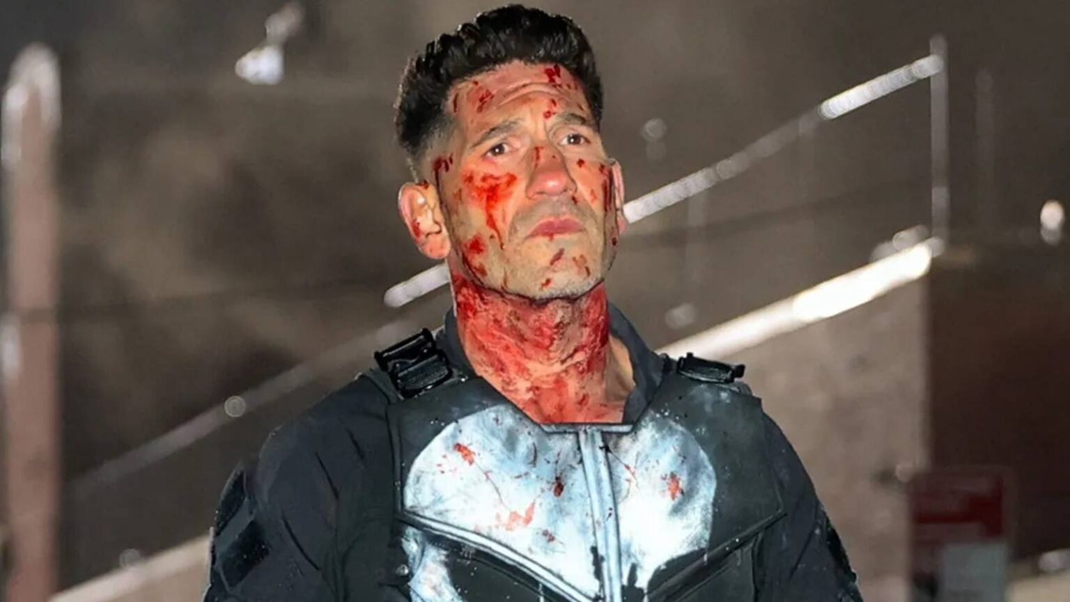Jon bernthal as the punisher covered in blood.jpg