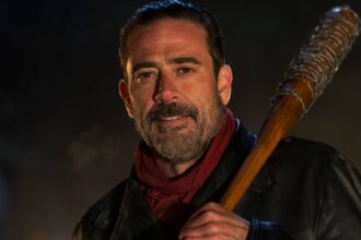 Negan smith holding his iconic bat lucille in the walking dead.jpg