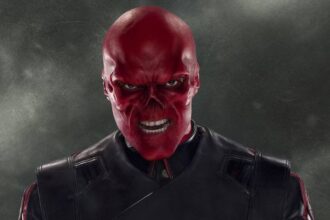 Red skull snarling against a grey backdrop.jpg