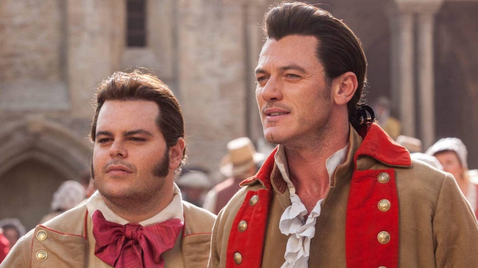 Luke evans as gaston and josh gad as lefou in beauty and the beast 2017.jpg