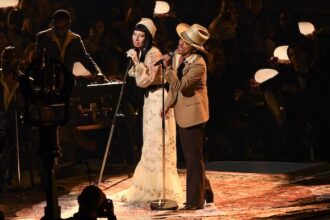 Lady gaga bruno mars 2025 grammys getty grid.jpeg