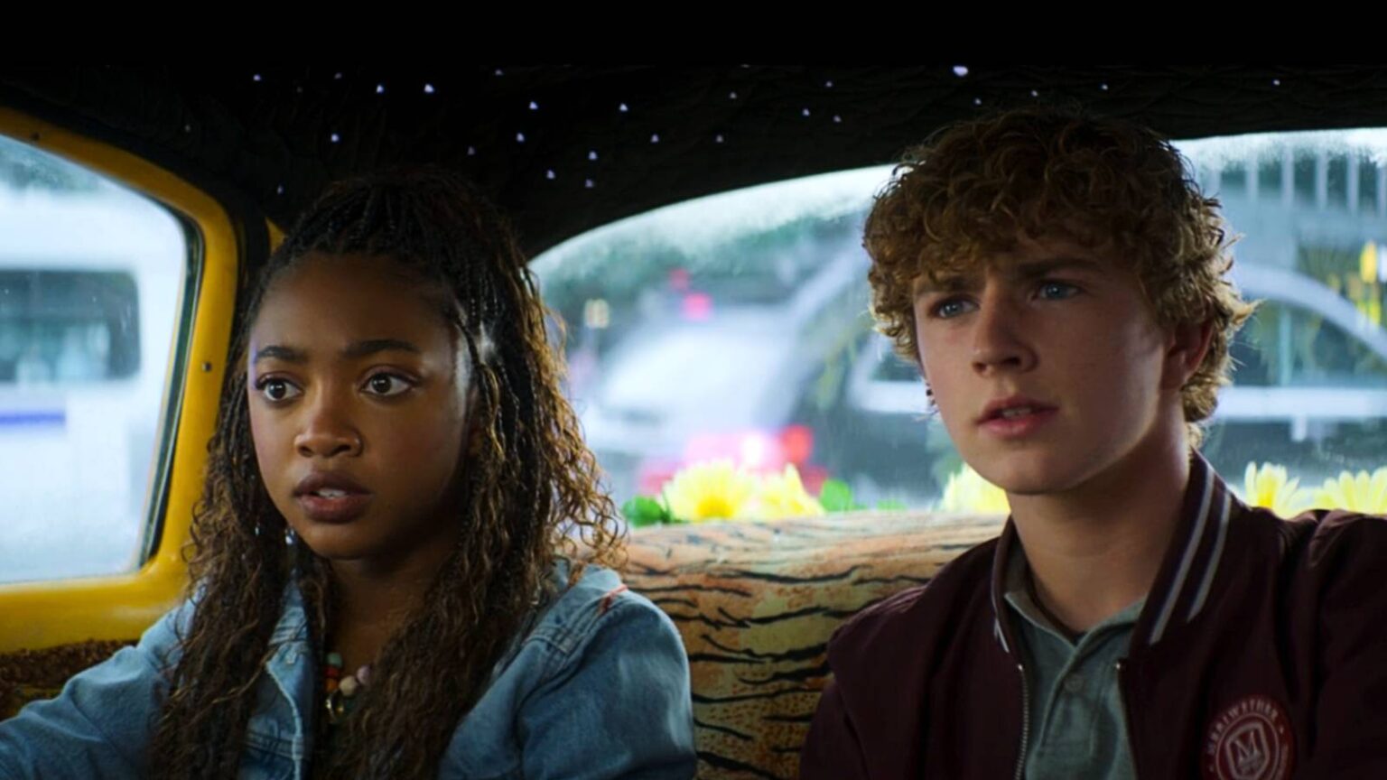 Percy and annabeth sitting in a cab in percy jackson and the olympians season 2 episode 1.jpg