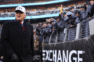 Trump amy navy game getty h 2025.png