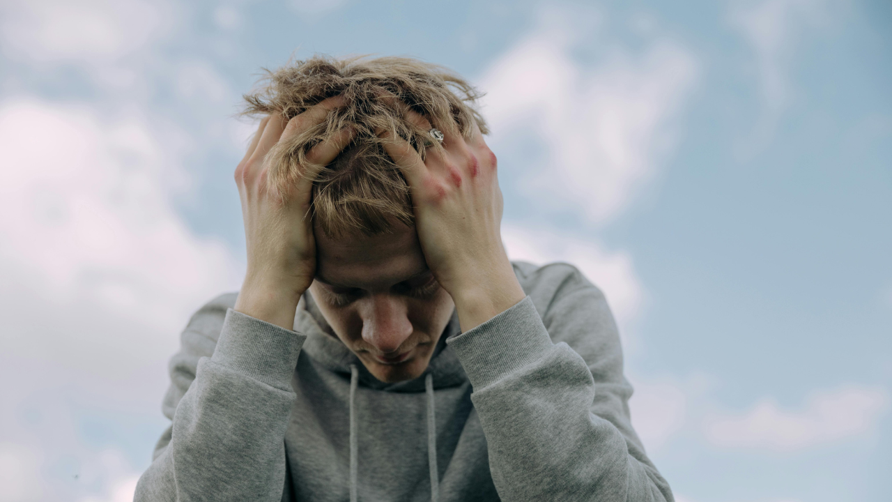 Man with bruises on hands.png