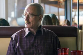 Bryan cranston s walter white sits in a diner in el camino a breaking bad movie.jpeg