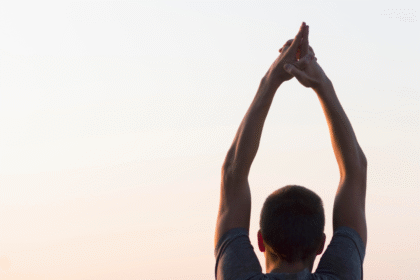Man with hands air looking sky.png