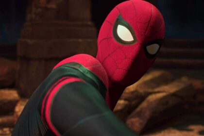 Tom holland s spider man looking back at doctor strange in spider man no way home.jpg