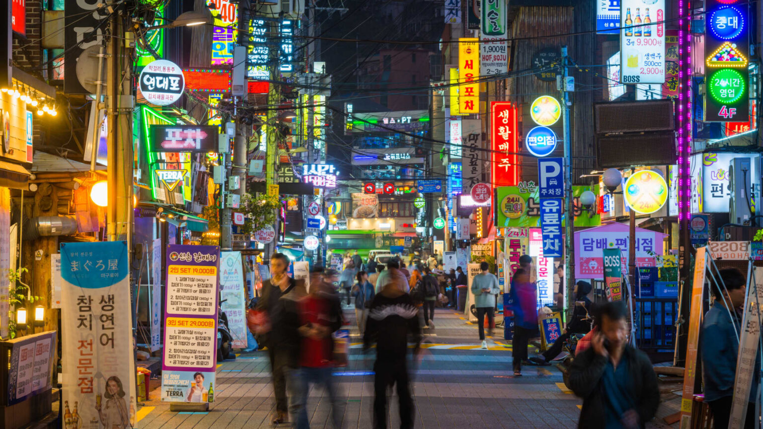 108095373 1738292856985 gettyimages 1507077883 seoulneonnightscrowdedshoppingstreetsdowntowncityscap.jpeg