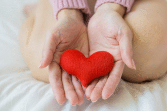 Heart in the hand of a woman.png