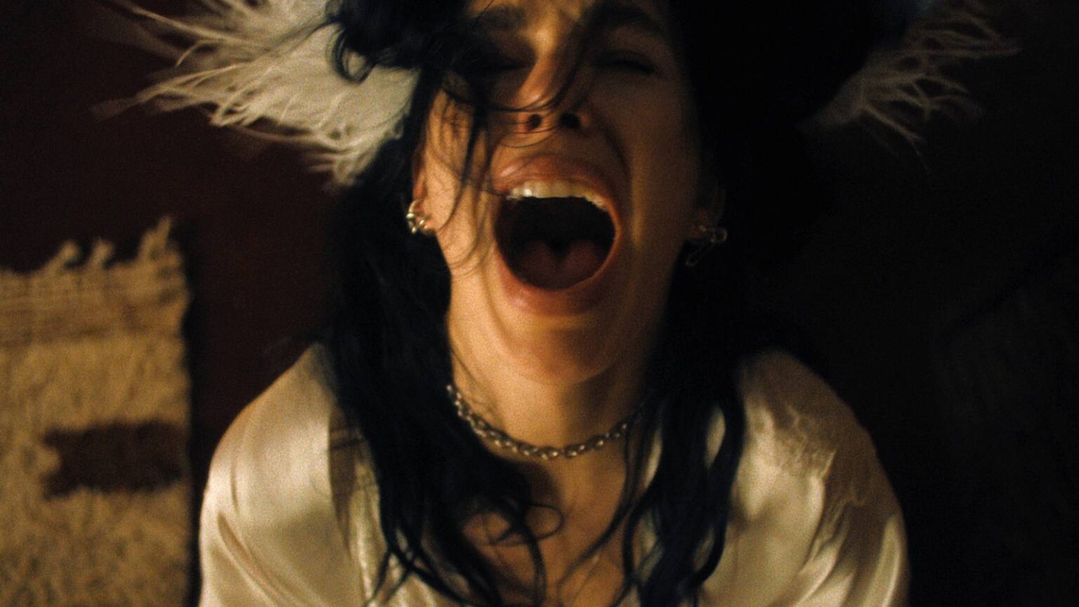 Camila morrone as rachel harkin in episode 6 of something very bad is going to happen.jpg