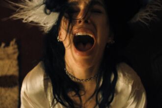 Camila morrone as rachel harkin in episode 6 of something very bad is going to happen.jpg