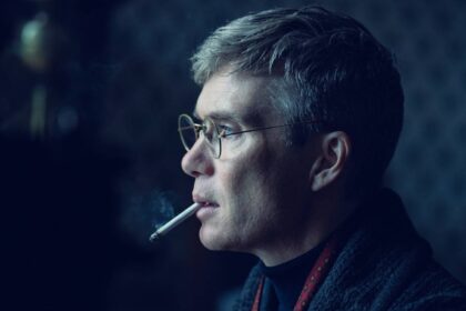 Cillian murphy as tommy shelby smoking a cigarette in peaky blinders the immortal man.jpg