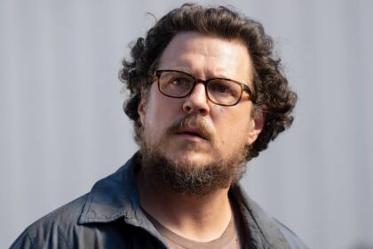 Close up of gary cameron britton as he looks at something in paradise season 2.jpg