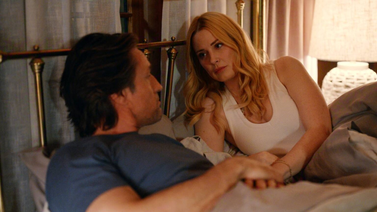 Jack and mel look upset while laying in bed together in virgin river season 7.jpg
