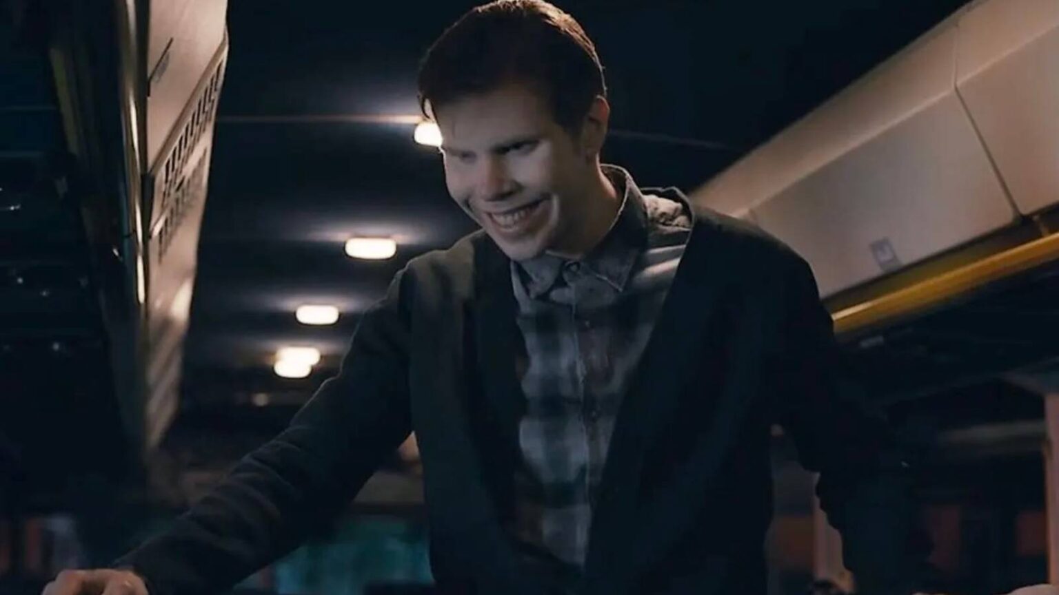A creepy creature smiles on the bus in from season 2.jpg
