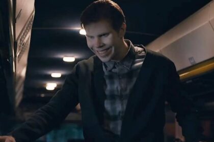 A creepy creature smiles on the bus in from season 2.jpg