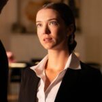 Nicole brydon bloom as jane looking up at someone in paradise season 2.jpg