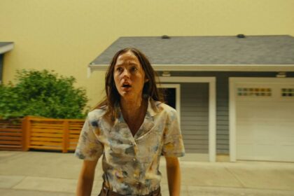 Renate reinsve covered in blood and running through a neighborhood in the backrooms movie.jpg