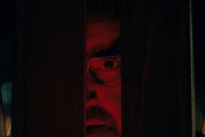 Alfred molina as sam cooper under red light in the boroughs.jpg