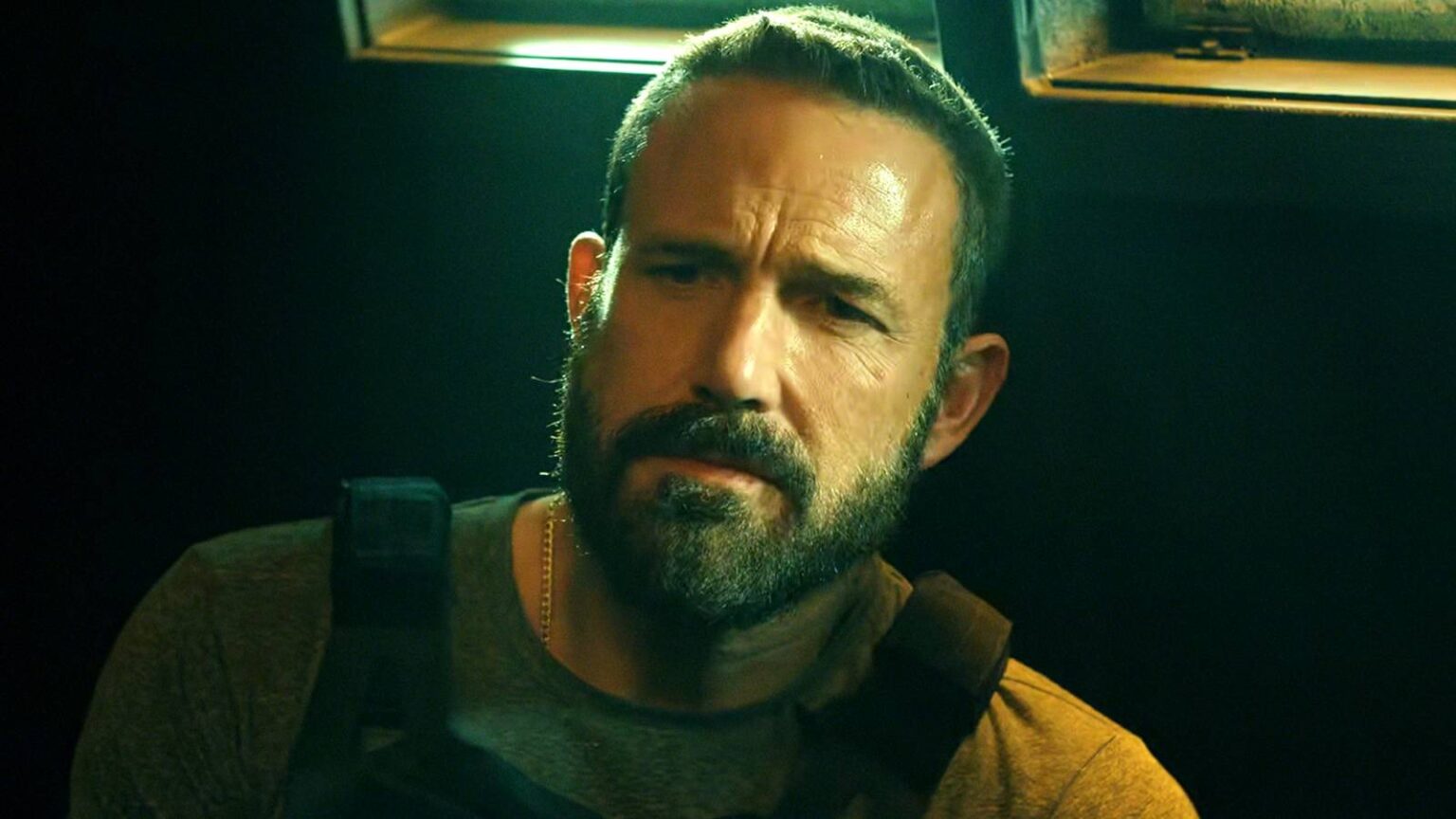 Ben affleck looking sternly at steven yeun in the rip.jpg