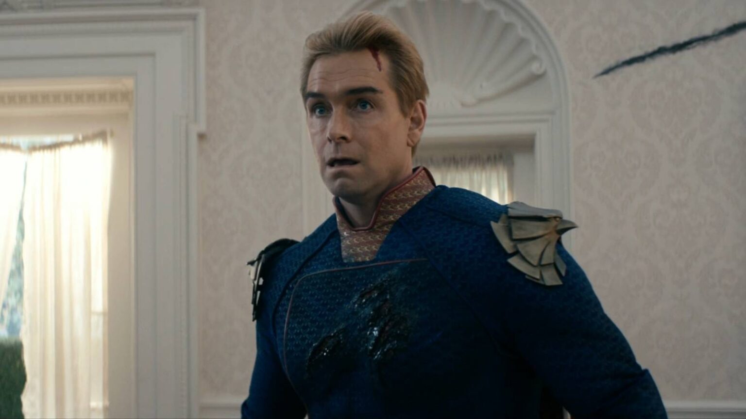 Homelander bleeding and looking somewhat surprised in the boys season 5 episode 8.jpg
