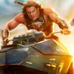Nicholas galitzine as he man driving a flying vehicle on the imax poster for masters of the universe.jpeg