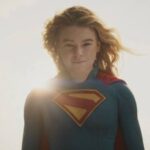 Supergirl framed in light from behind her.jpg