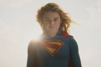 Supergirl framed in light from behind her.jpg