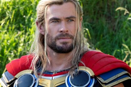 Thor smiling in the mcu s love and thunder.jpg